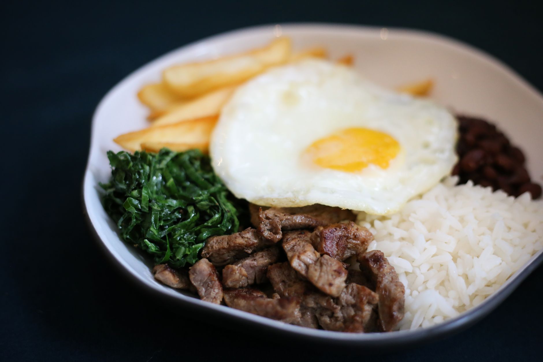 Steak and roasted vegetable bowl with herbed grains